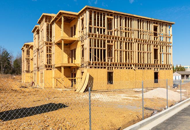 a mobile fence protecting a construction site and workers in Chickasaw